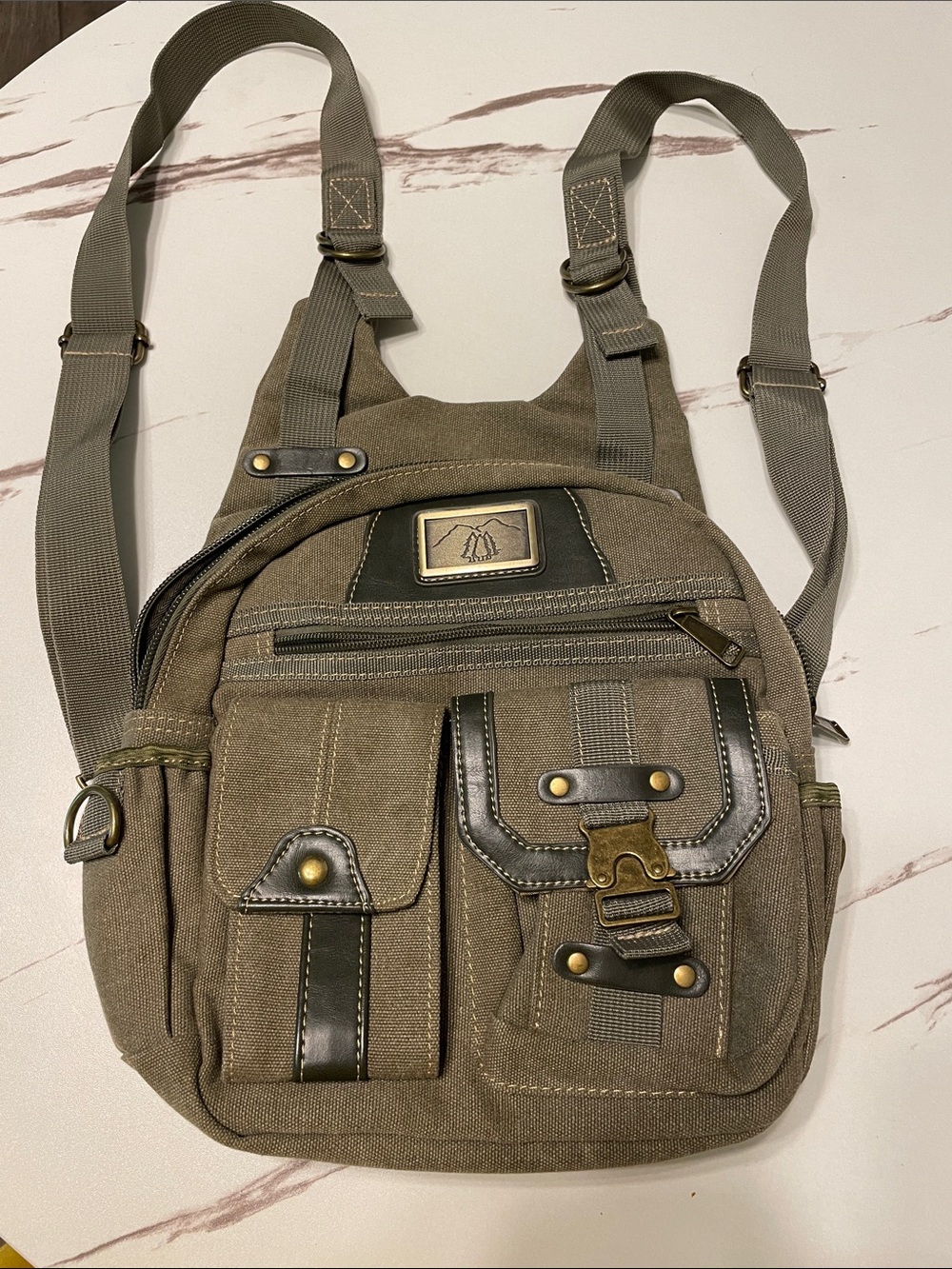 Prairie Sconer Olive Canvas Men's Compact Backpack with Vintage Hardware
